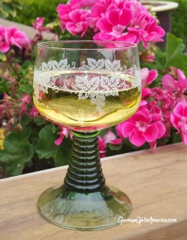 green stemmed wine glasses